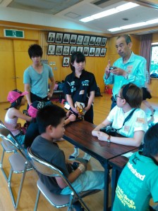 Children receiving instruction in a photography class.